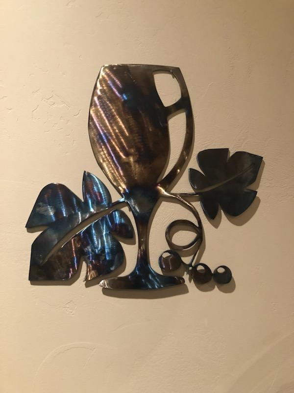 Torch finished steel wine glass and grapevine wall art